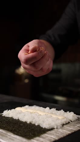 sushi preparation by a chef