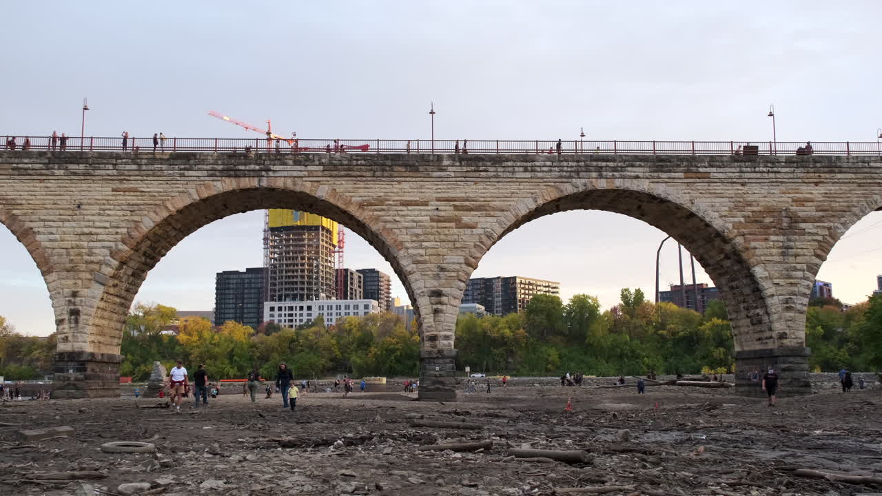 People Exploring Mississippi Riverbed During Drawdown For Inspection
