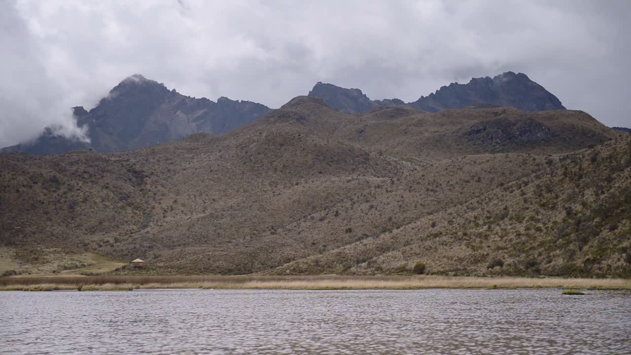 Mountain landscape view of Ruminawi Volcano over Lake Limpiopungo, Ecuador, on a cloudy day