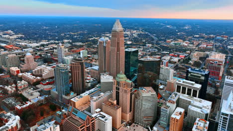 spectacular view on the vast cityscape of charlotte, nc, usa. drone approaching the highest building in the architecture of downtown