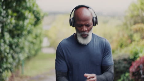 senior man, drinking water and fitness