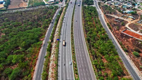 vehicles going on nehru outer ring road and services road in hyderabad, telangana. 4k, day time, drone shot.