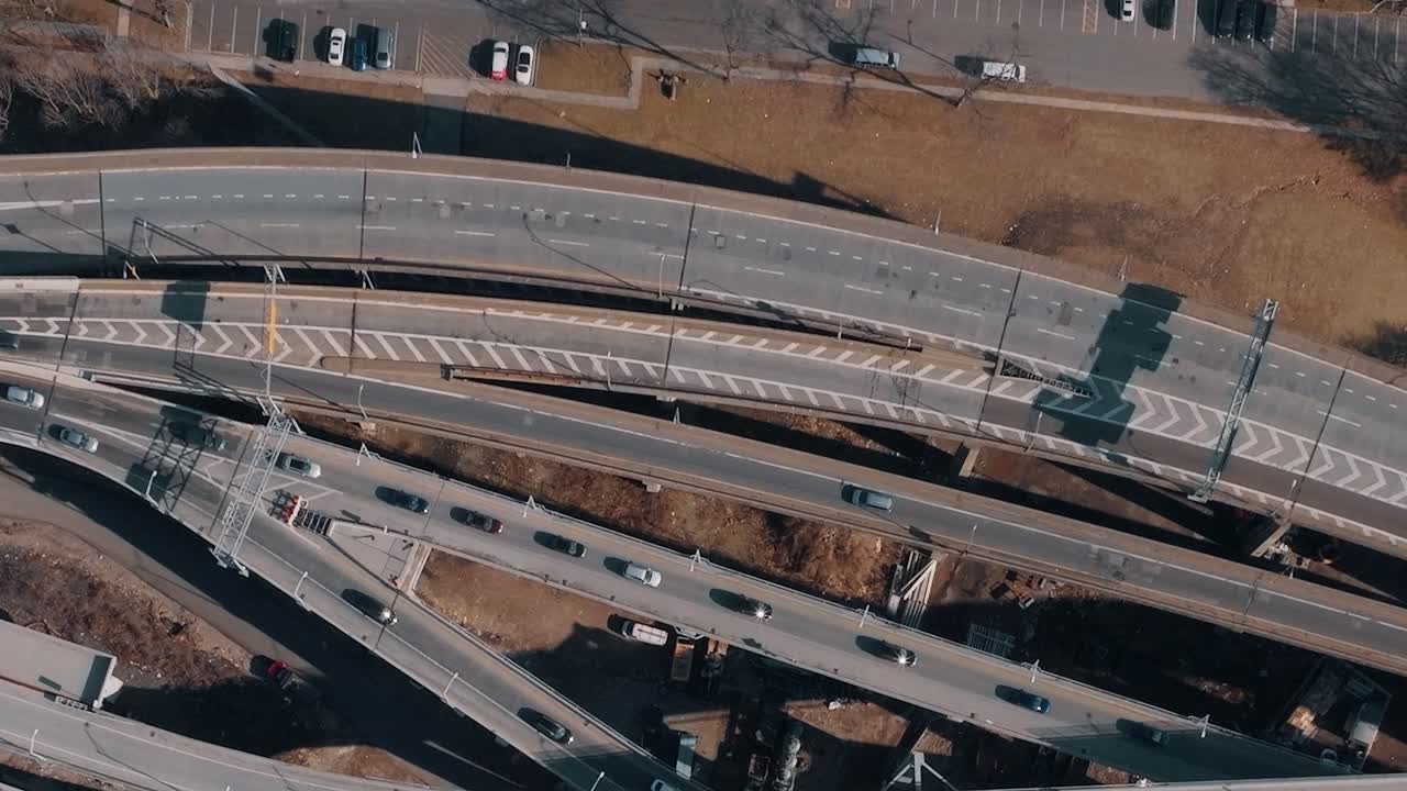 Traffic flows along highways in New York during midday hours