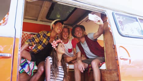 Group-of-friends-taking-selfie-with-mobile-phone-4k