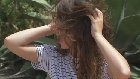 woman smiling and laughing outdoors