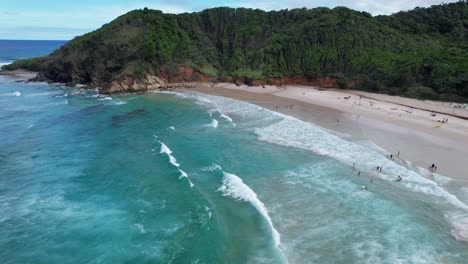 Tourists-At-Broken-Head-Beach,-Byron-Bay,-NSW,-Australia---Aerial-Drone-Shot