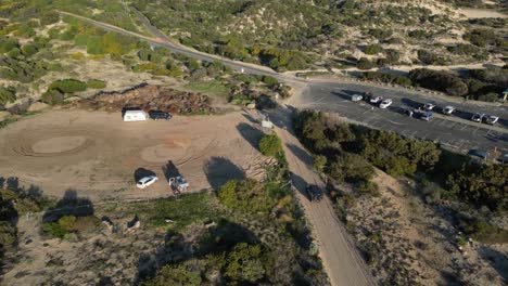 Vehicle-driving-to-Preston-Beach-parking-along-coast,-Western-Australia