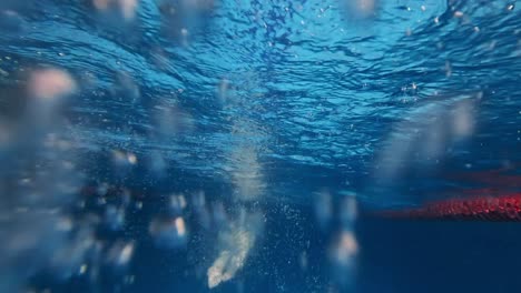 girl swimming underwater