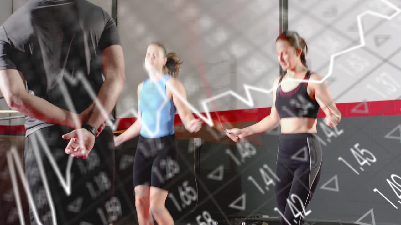 Female trainees skipping in gym after coach cue, animated metrics overlaying trainees for tracking