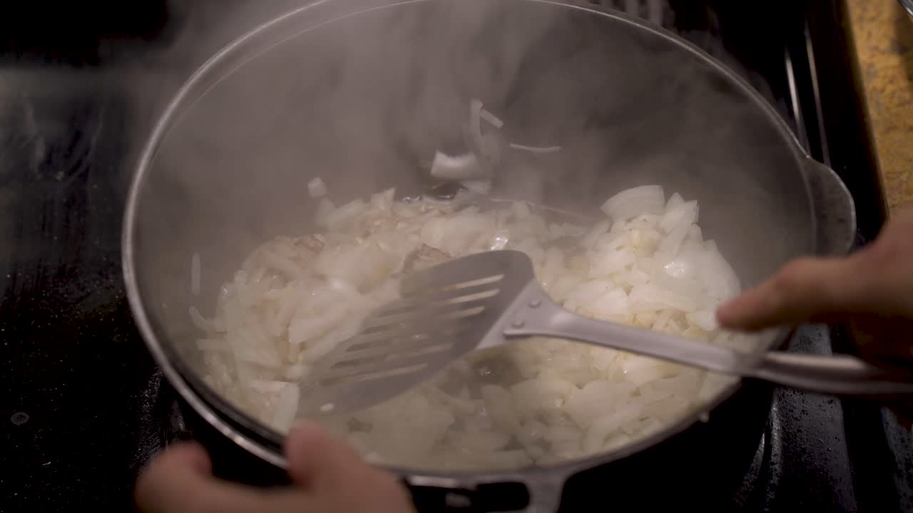 Cooking onions in a pot