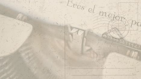animación de una máquina de escribir antigua con una carta escrita en español sobre un sobre estampado
