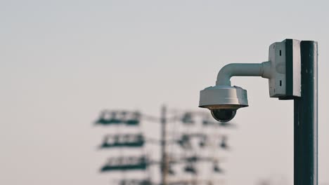 A-close-up-of-a-Closed-Circuit-Camera,-CCTV-installed-on-the-rooftop-of-a-building-in-Dubai