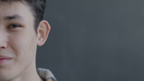 close-up of a smiling teenager's face