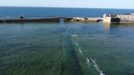 Swimmers-swimming-in-the-mediterranean-coast