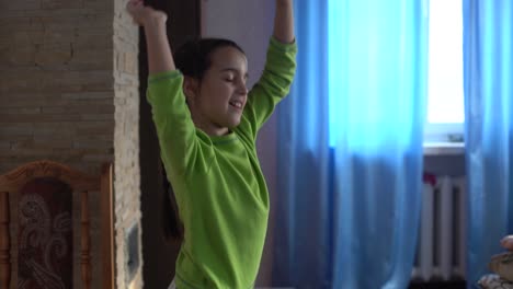 Teenager-girl-dancing,-when-making-video-for-social-media,-stories-hip-hop-popular-trandy-dance,-students-at-home-make-content-for-video-focused-social-networking-service