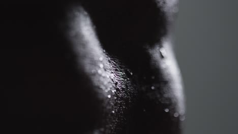 close up shot of beads of sweat on woman wearing gym fitness clothing exercising 1