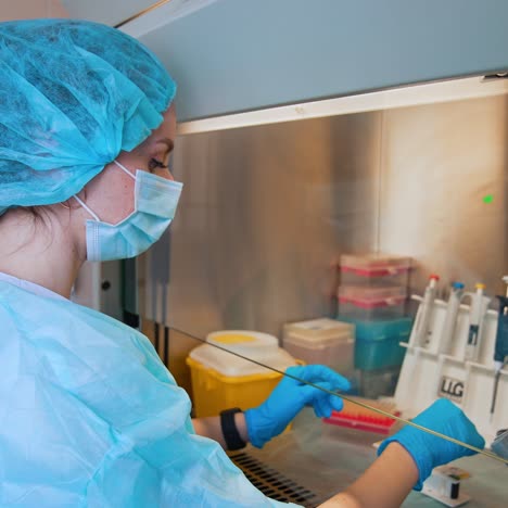 technician hand holding collection tubes. portrait of medical worker holding sample test kit