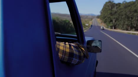 young man on a road trip in pick-up truck