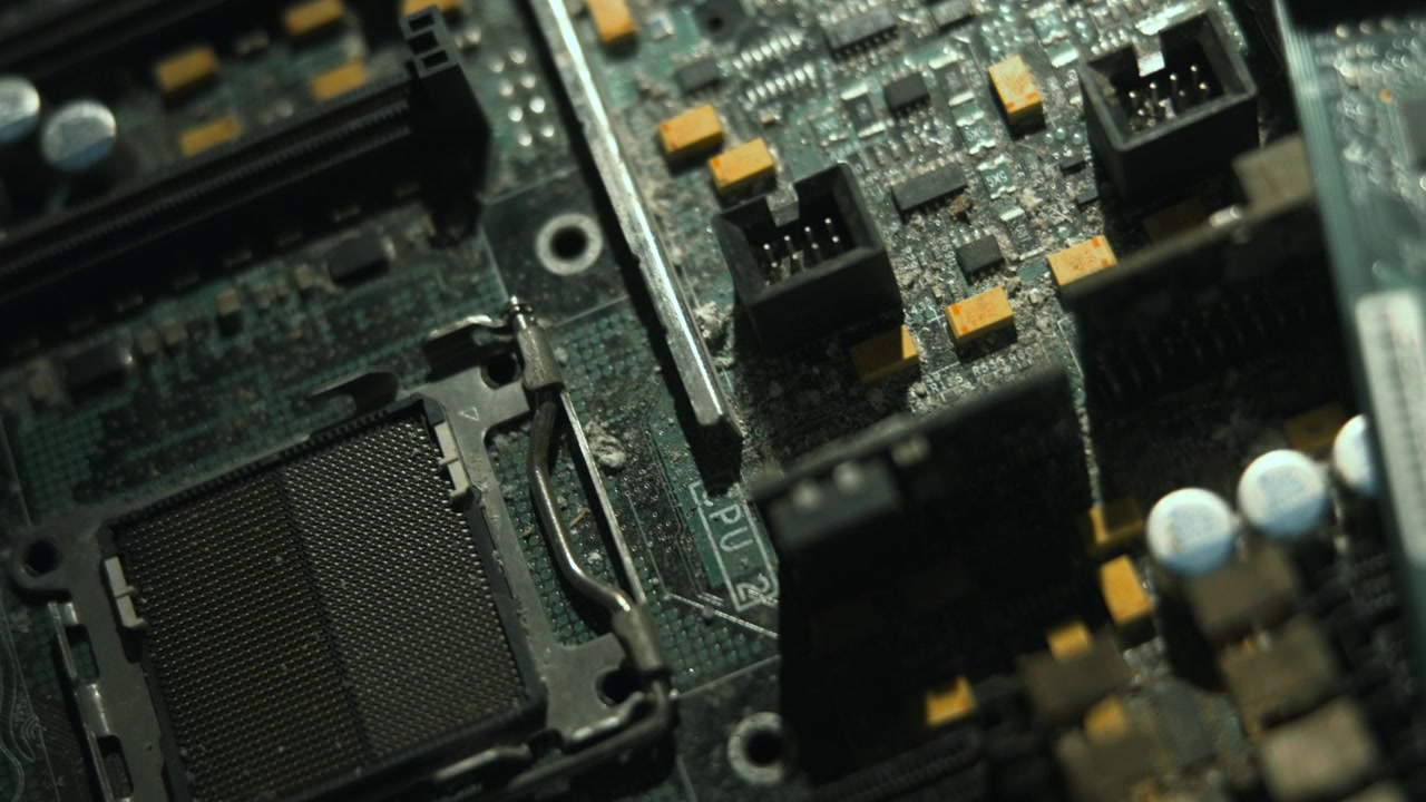 Extreme Closeup Of Cpu Socket Area With Exposed Pins And Solder Pads, Green PCB And Surrounding Passive