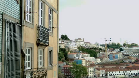 a house facade with the town in the background in porto, portugal