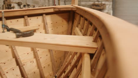 traditional lapstrake construction, closeup of a wooden bow framework