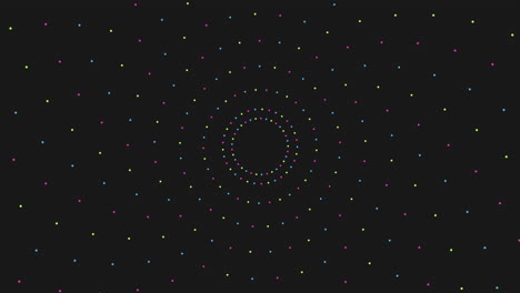 a vibrant and symmetrical circular pattern composed of colorful circles like purple, yellow, and green, on a black background. the design showcases a harmonious and balanced composition