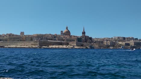 panoramic view of valletta skyline from sliema with church of our lady of mount carmel capital city of malta, 4k
