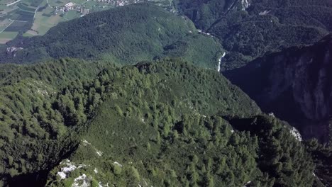 Aerial-reveal-type-shot-starting-with-a-top-view-of-Cima-Vezzena,-also-called-Pizzo-di-Levico,-ending-with-with-panoramic-views-of-Trentino,-Italy