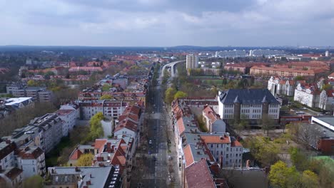 Spectacular-aerial-top-view-flight-German-Street-in-Berlin-City-at-cloudy-day,-district-Steglitz