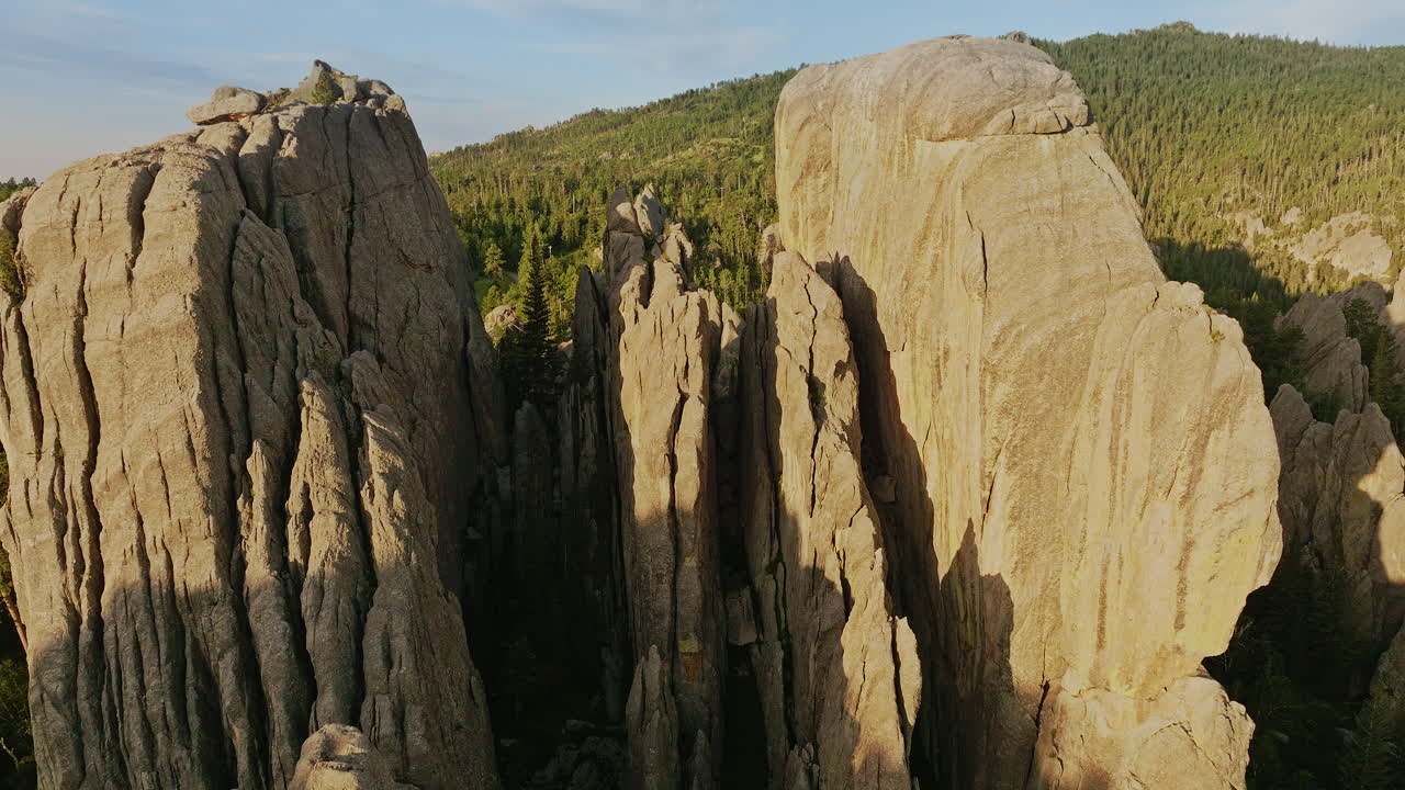 Drone captures a stunning aerial view of layered rock formations in the western United States.