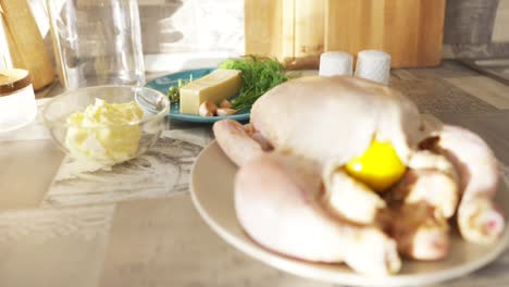 raw chicken with butter and lemon for cooking