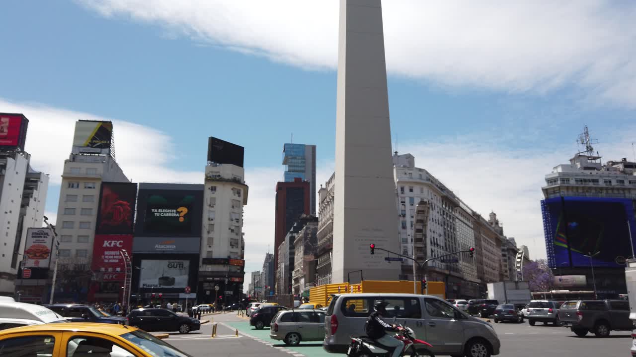 Traffic at 9 de Julio Avenue, Obelisk of buenos aires city argentina, business busy commercial center