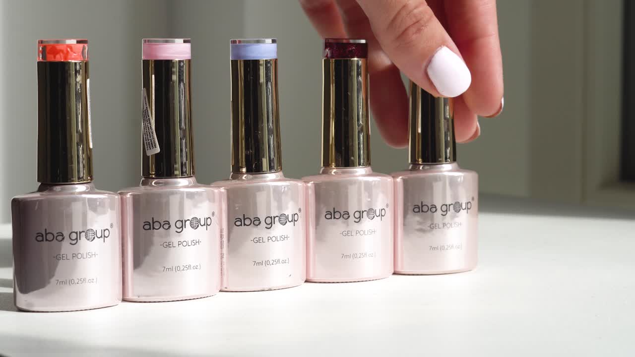 Nail polishes stacking for the advert commercial shoot. Sales advert video for Aba Group nail polish.