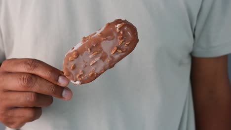 chocolate covered popsicle with nuts