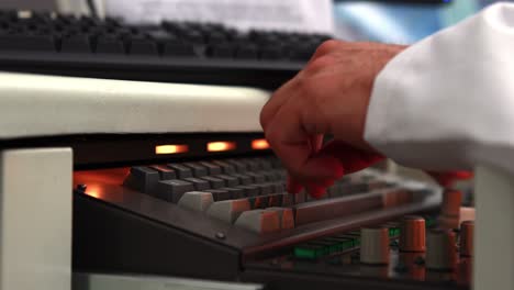 young science student typing on keyboard