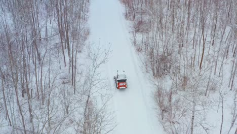 bobcat clearing snow on a rural property