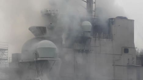 Fighting-A-Fire-Aboard-Amphibious-Assault-Ship-Uss-Bonhomme-Richard-Dockside-At-Naval-Base-San-Diego-Ca