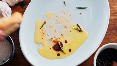 bread dipping in olive oil with spices