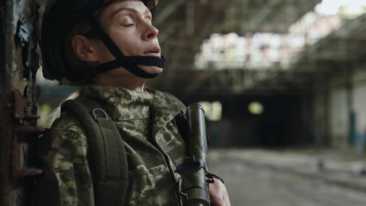 Female Soldier in Abandoned Building