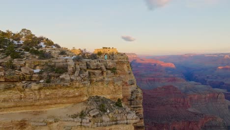 breathtaking view of a person over the kaibab limestone in grand canyon national park in arizona, usa