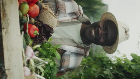 Smiling Farmer with Fresh Vegetables