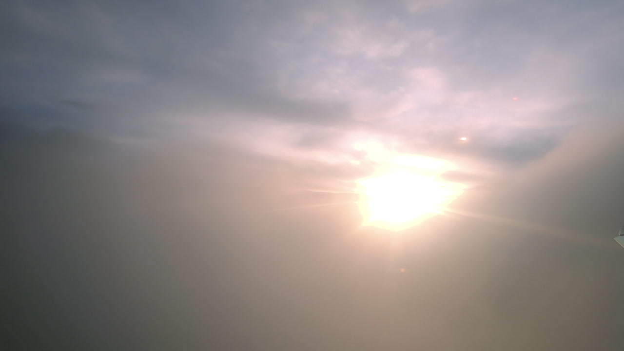 Looking at the clouds and Da Nang city in the airplane in Asia.