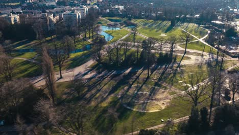 aerial hyperlapse showing buildings, cars and city landscape