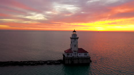 faro del puerto de chicago y centro de la ciudad desde el este al amanecer