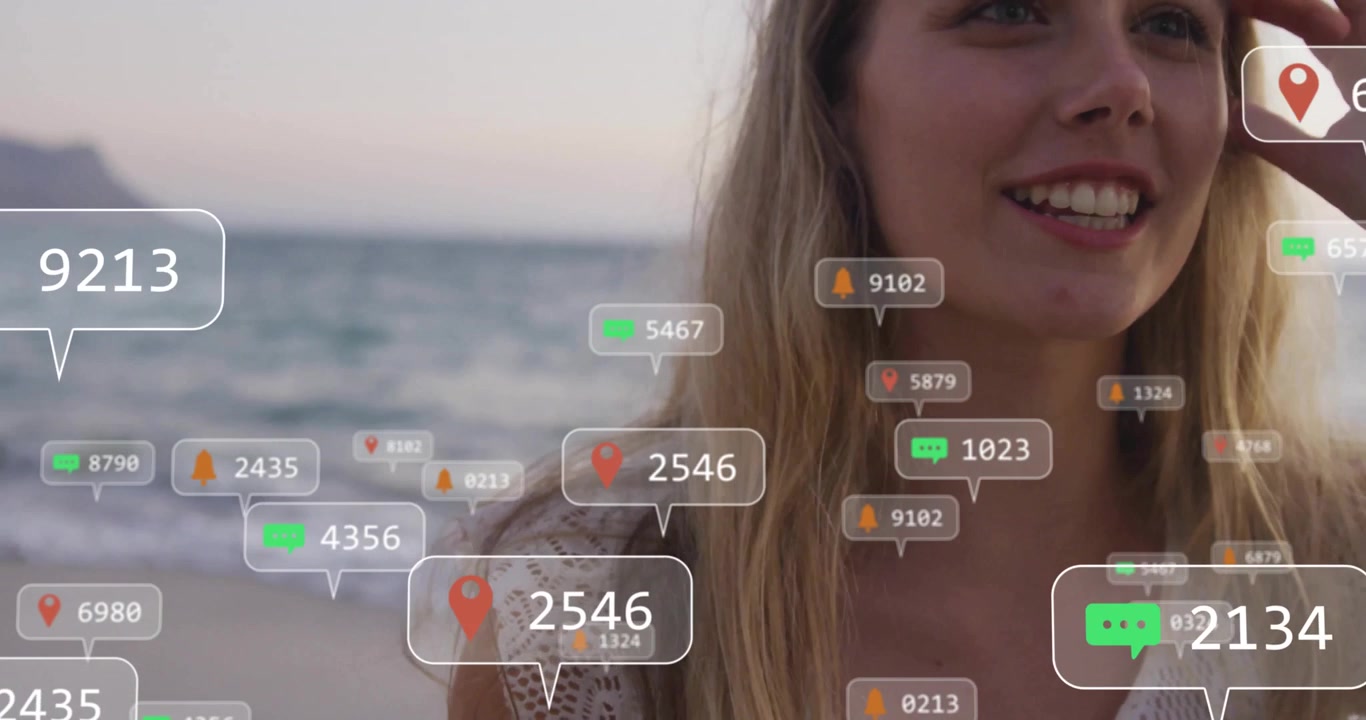 Creator standing shore at sunset seeing marker appearing and AR icons rising showing tech growth