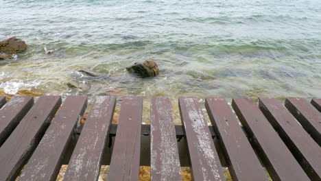 close-up terrace wooden pattern. beach sea background