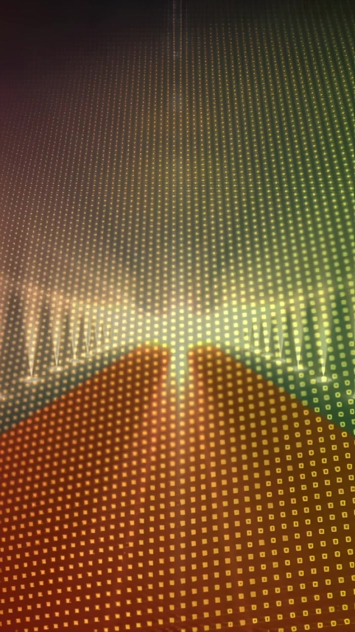 Video verticale: Luce che si sposta su un pannello di pixel, illuminando una griglia e cambiando colore, rivelando la texture