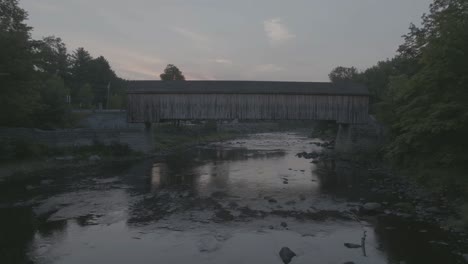 Aerial-flight-under-Lowes-Bridge-at-dawn