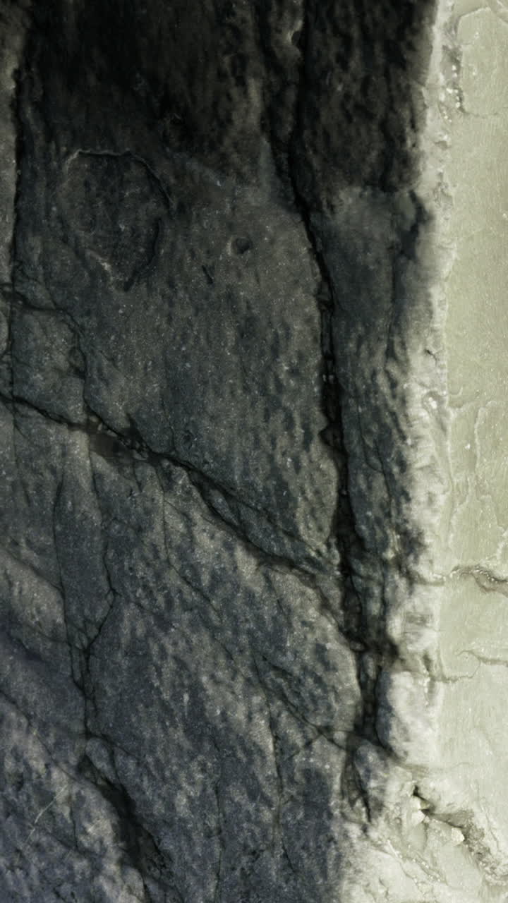 Textures and patterns of natural rock formations in a serene outdoor setting