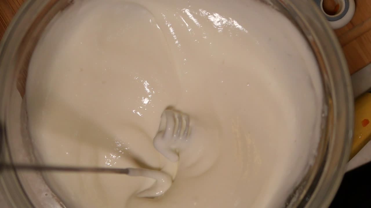 Whipping Cream in Glass Bowl